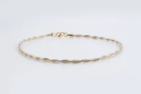 9 14k Two-Tone Gold Intertwined Snake Chain Bracelet (3.75g.)