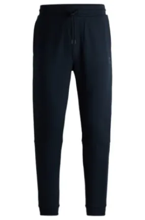 Cotton-terry tracksuit bottoms with logo patch