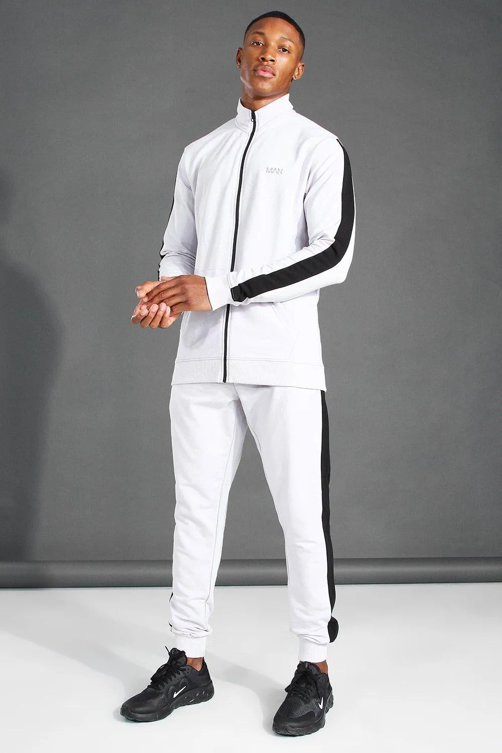 MAN Active Zip Funnel Neck Side Stripe Tracksuit | boohooMAN UK