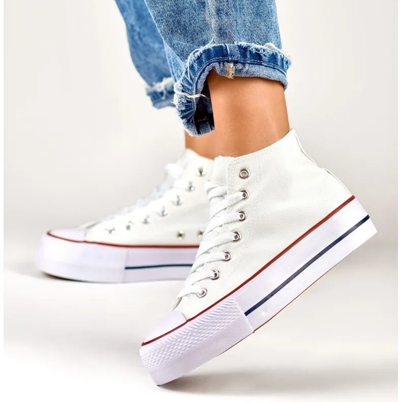 Women's white sneakers above the ankle