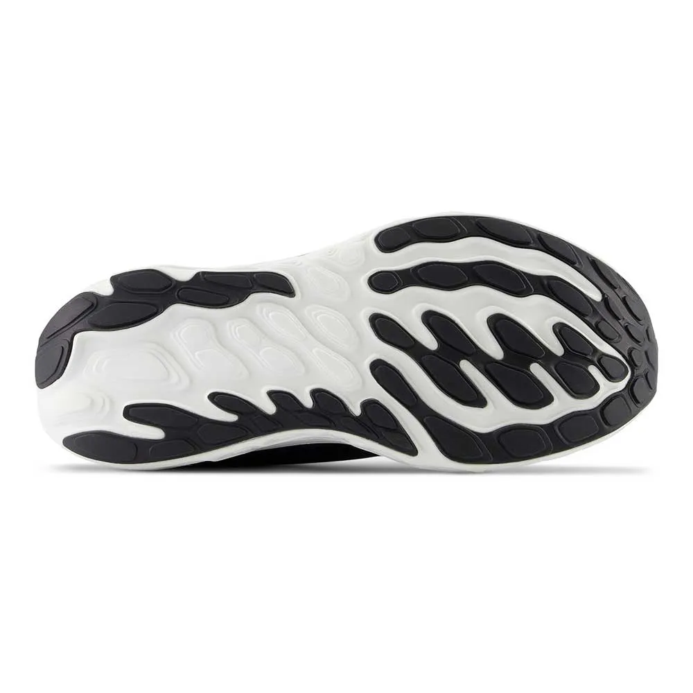 Women's Vongo v6 Running Shoe - Black/White - Regular (B)